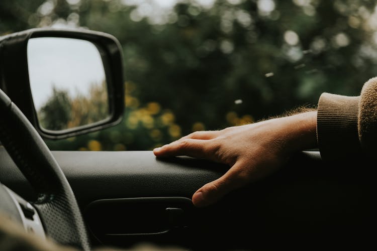 Hand On The Car Door 