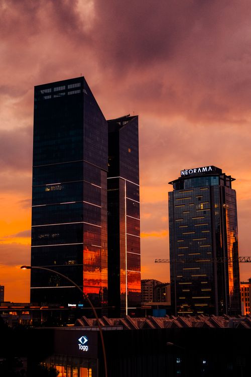 Free Stunning view of Ankara skyscrapers against a dramatic sunset sky. Stock Photo