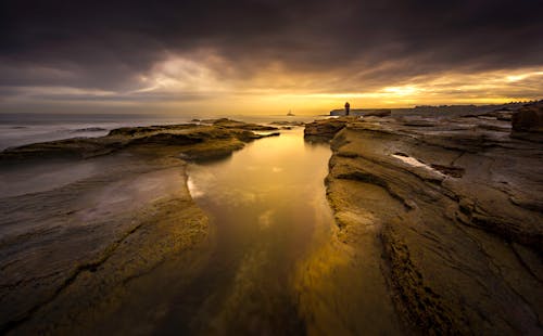 ฟรี คลังภาพถ่ายฟรี ของ ชายหาด, ซิลูเอตต์, ตะวันลับฟ้า คลังภาพถ่าย