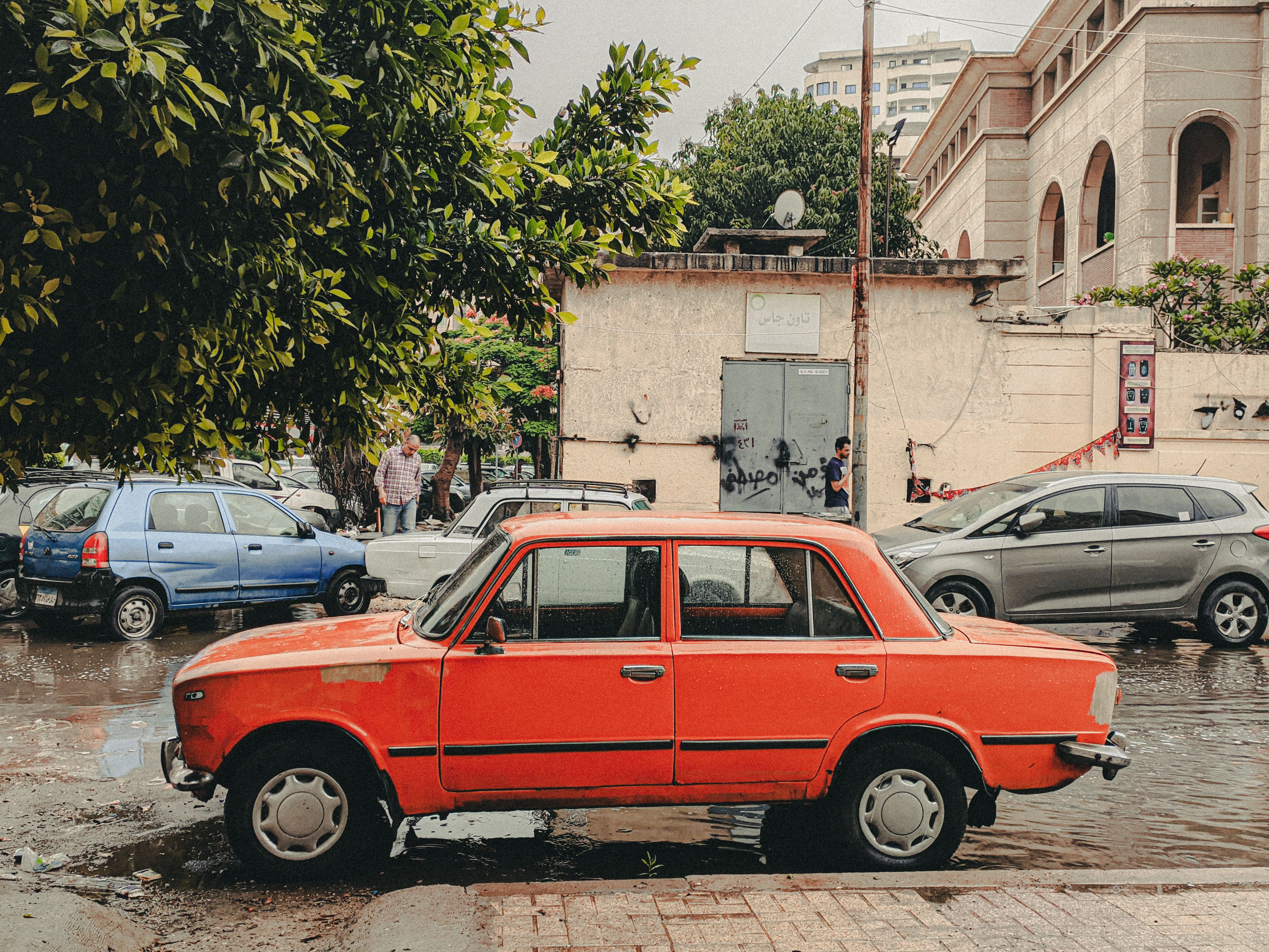 A car parked on the side of the road · Free Stock Photo