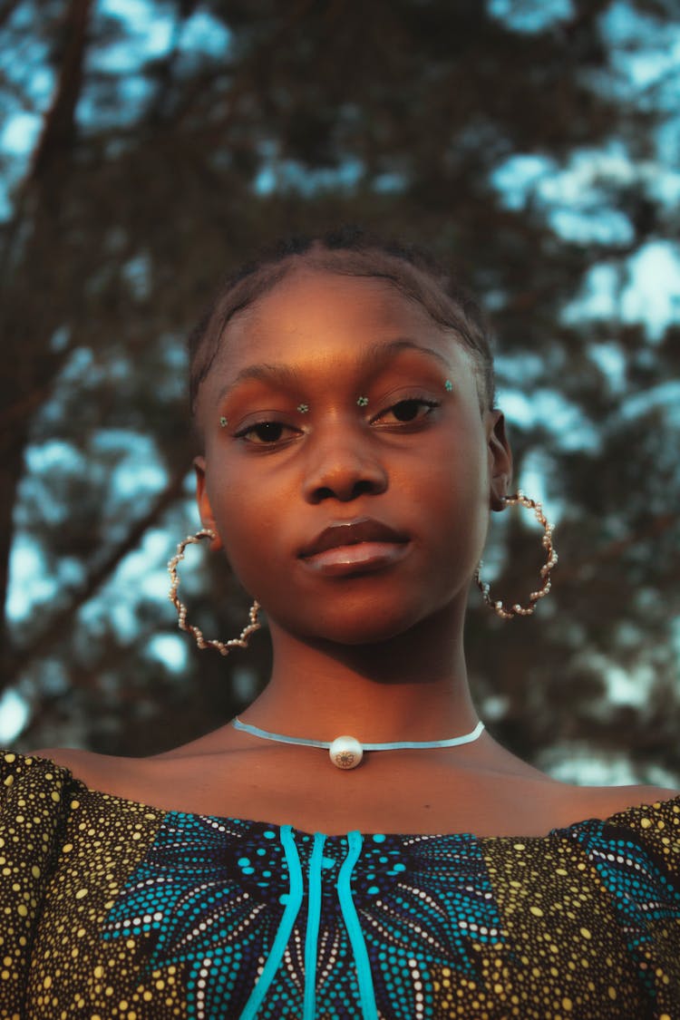 A Portrait Of A Young Woman In Forest