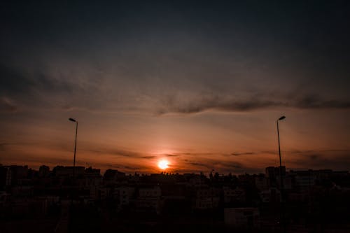 Бесплатное стоковое фото с атмосферный вечер, африканская этничность, багровое небо