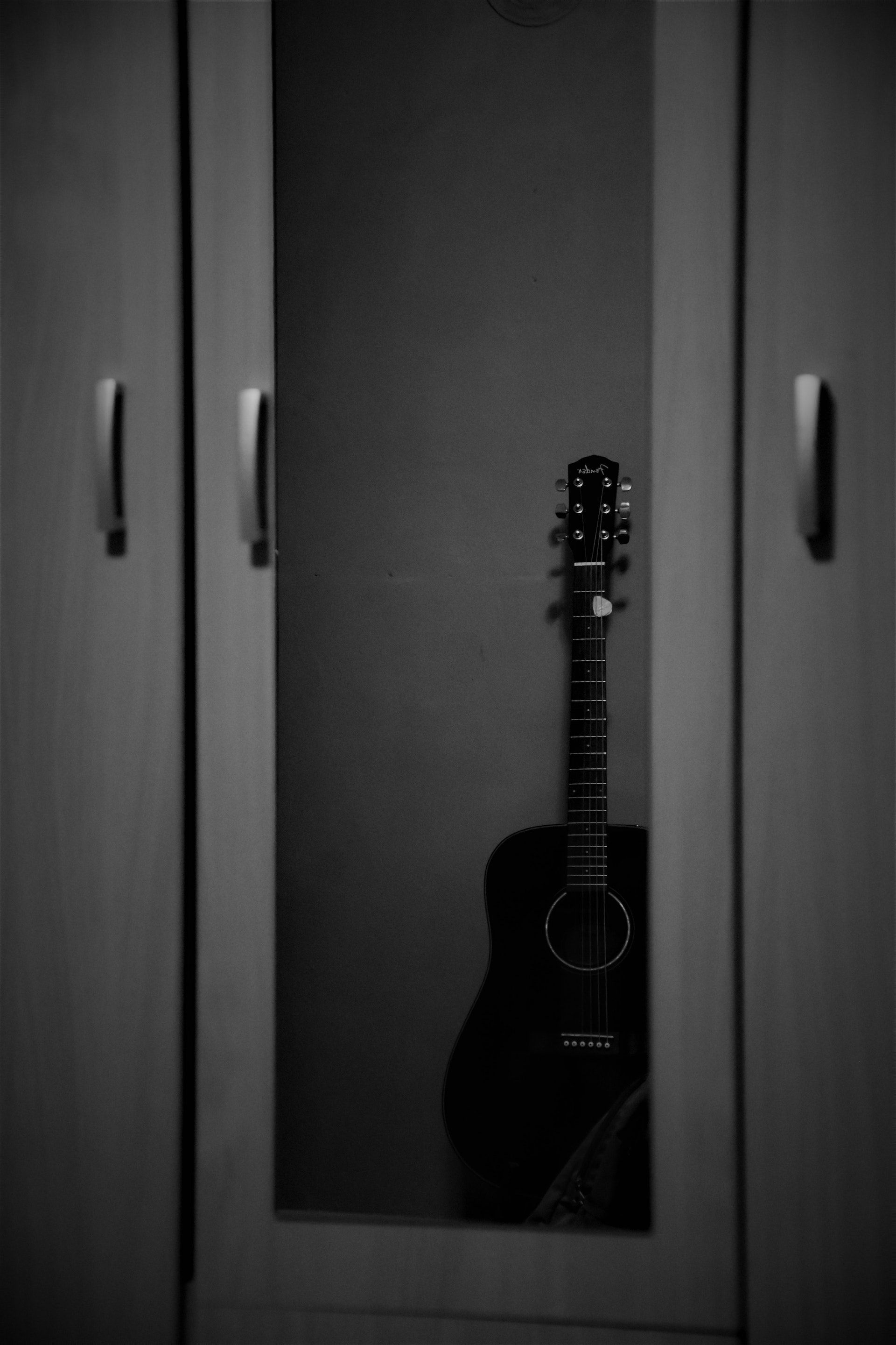 Guitar Reflection in Wardrobe Mirror · Free Stock Photo