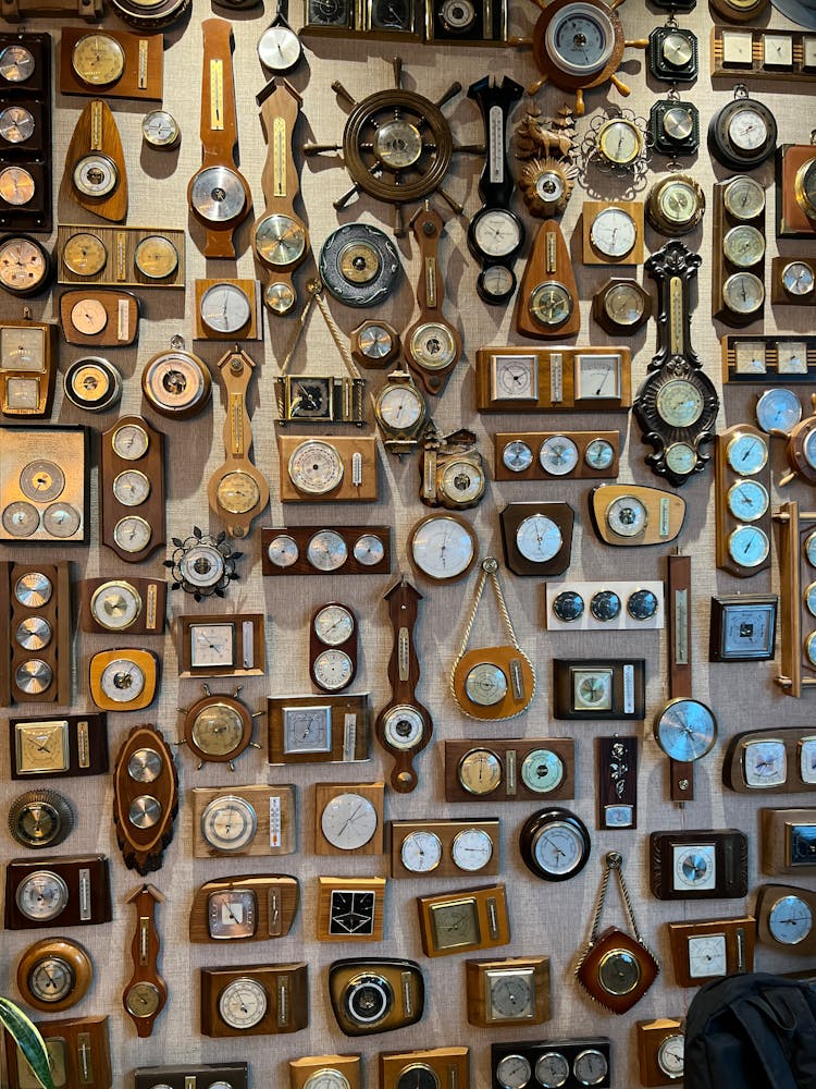 Collection Of Vintage Clocks On Wall