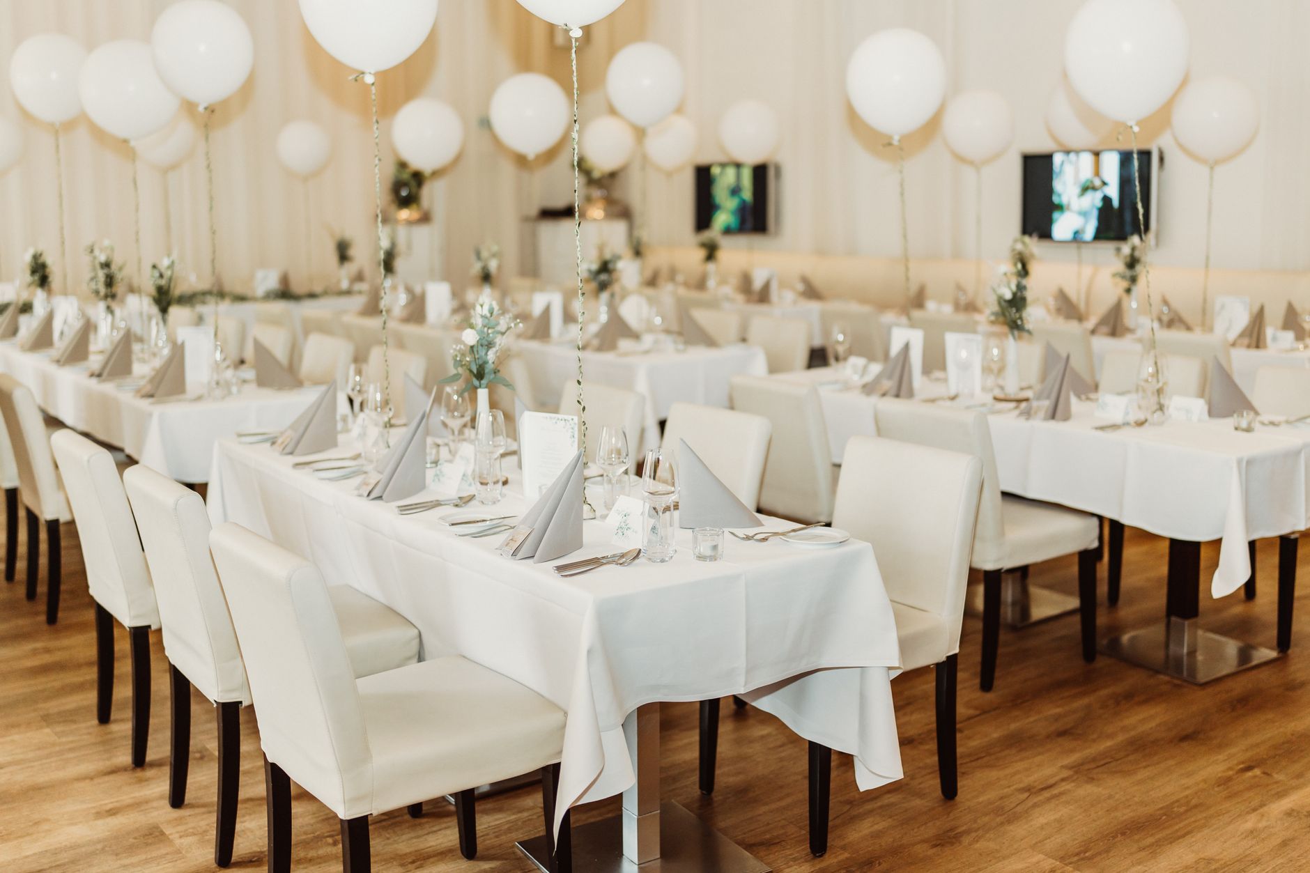 Wedding reception table set inside a restaurant