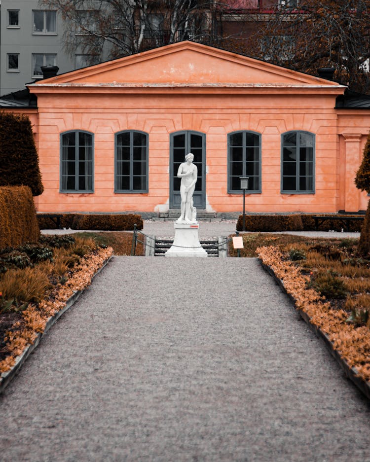 Building And Statue In Linnaeus Gardenin Uppsala In Sweden