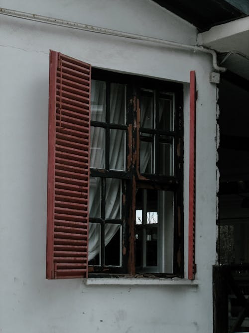 Free House Facade and Window with Red Shutters  Stock Photo