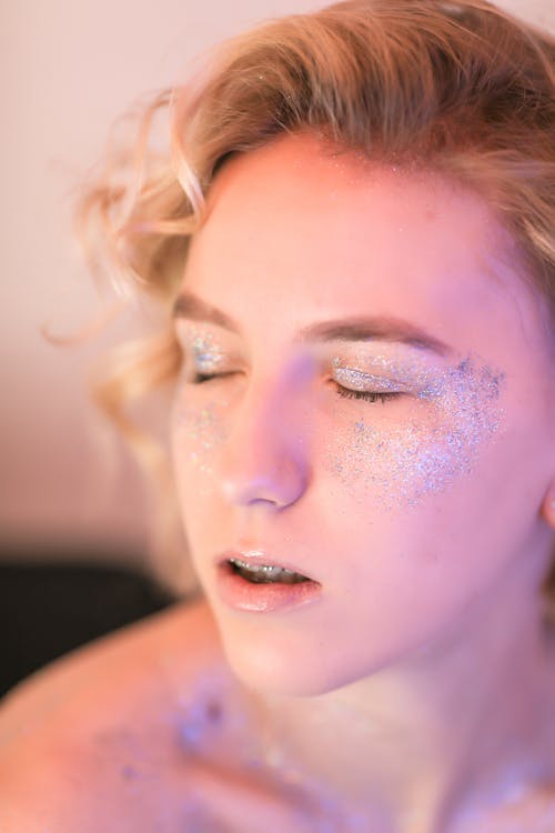 Face of a Woman with Glitter on her Cheeks and Eyes