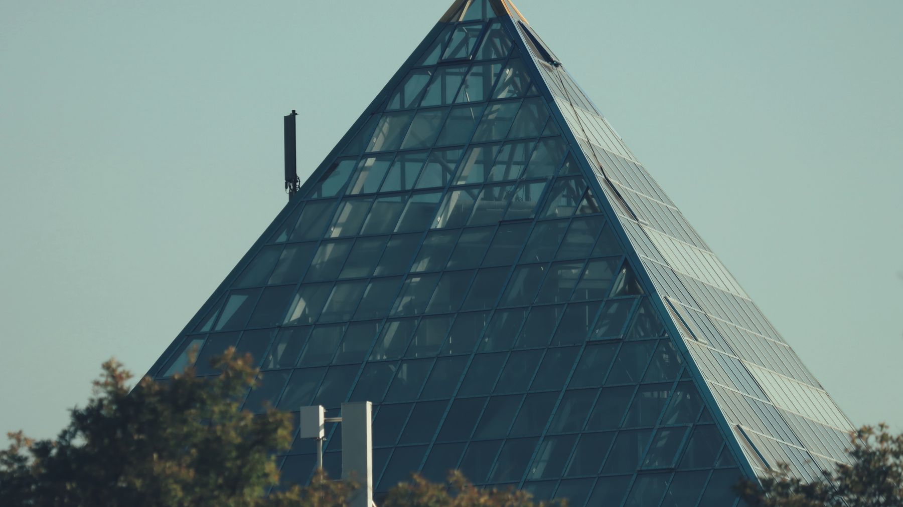 Close-up of a modern glass pyramid structure in Jönköping, Sweden.