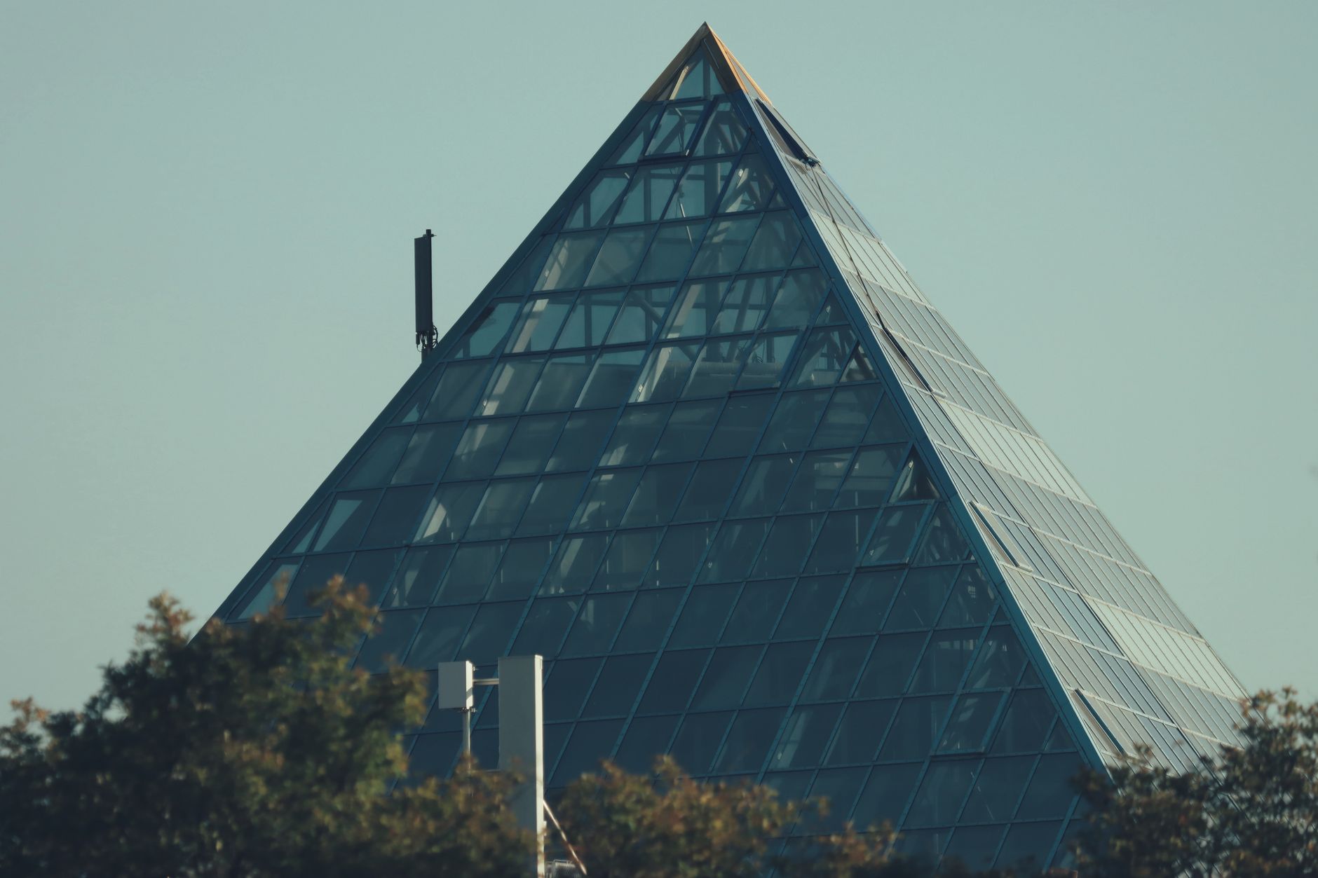 Close-up of a modern glass pyramid structure in Jönköping, Sweden.