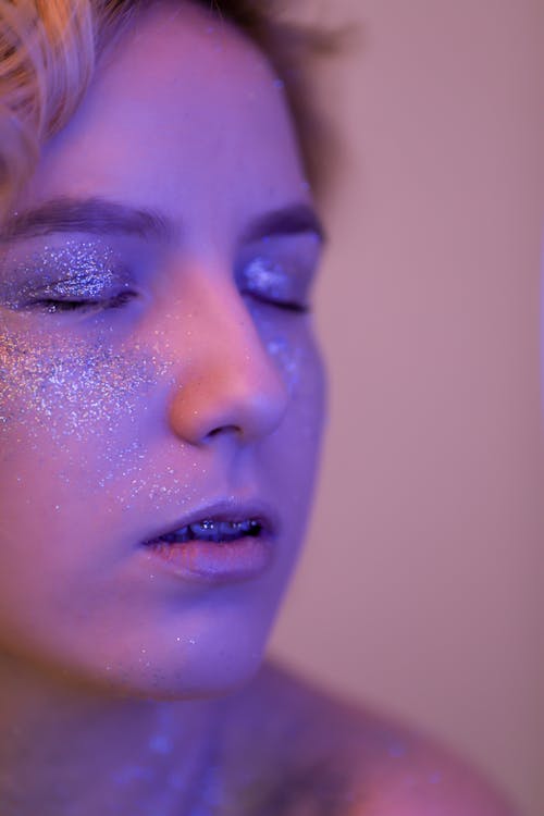 Portrait of a Young Woman with Glitter on her Face 
