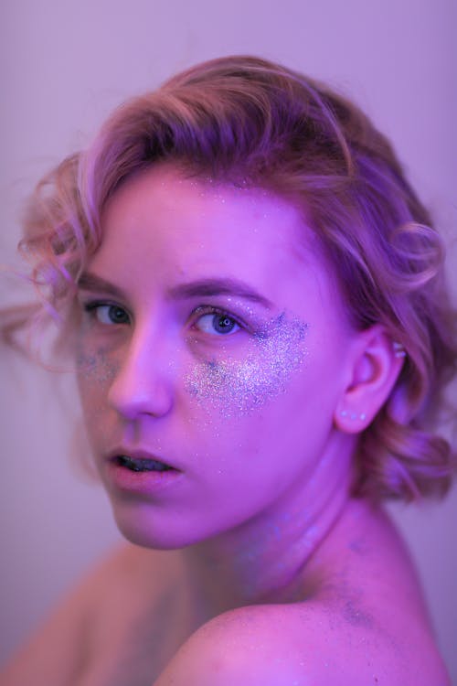 Young Topless Woman with Glitter on Body