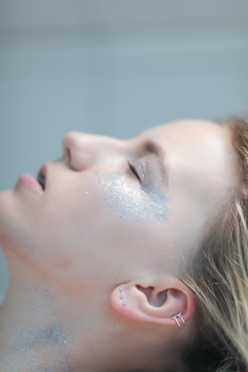 Young Woman with Glitter Makeup