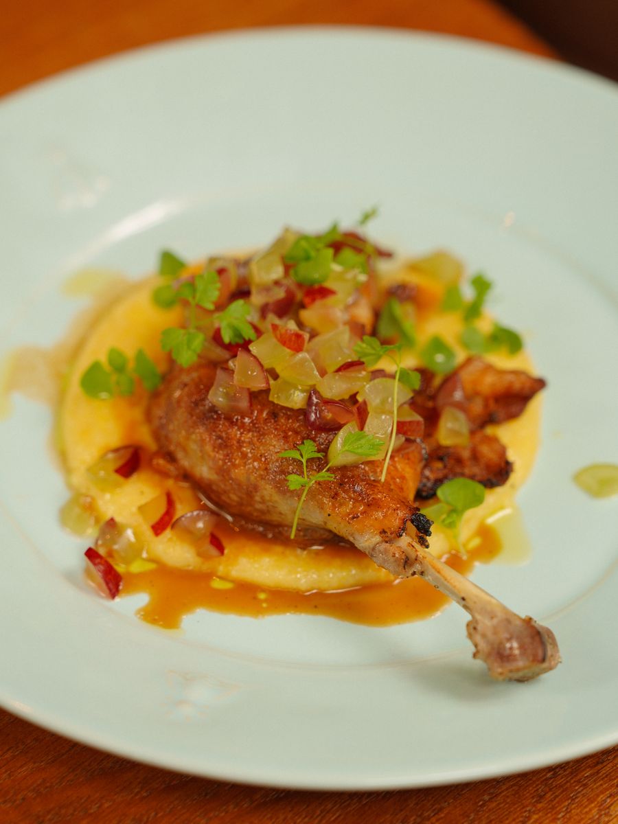 Seared duck confit on a golden purée