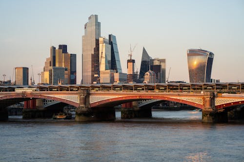 Bridge and Skyscrapers in London behind