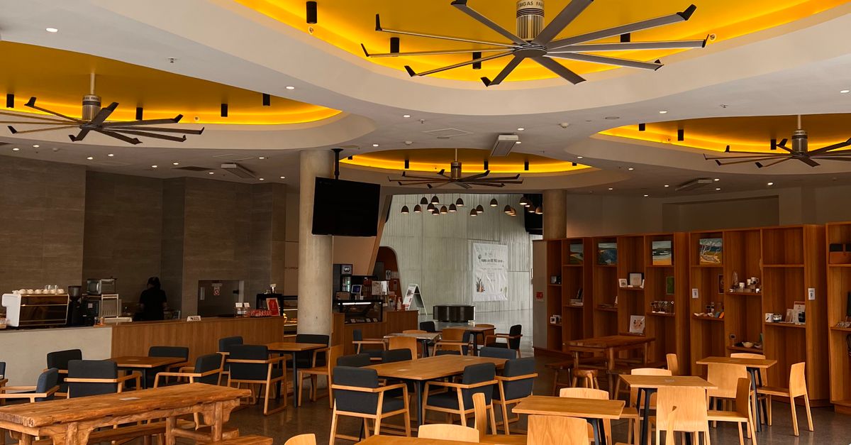 Yellow Ceiling over Tables in Restaurant · Free Stock Photo