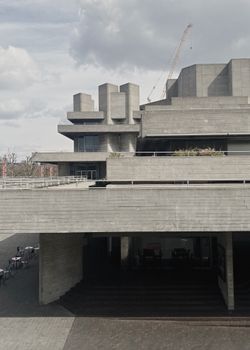 Concrete facade of the iconic Royal National Theatre in London showcasing brutalist architecture.. pexels, concrete, facade