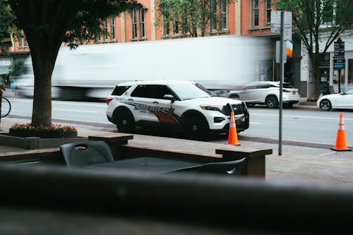 Free A Police Ford Interceptor on the Street in City  Stock Photo