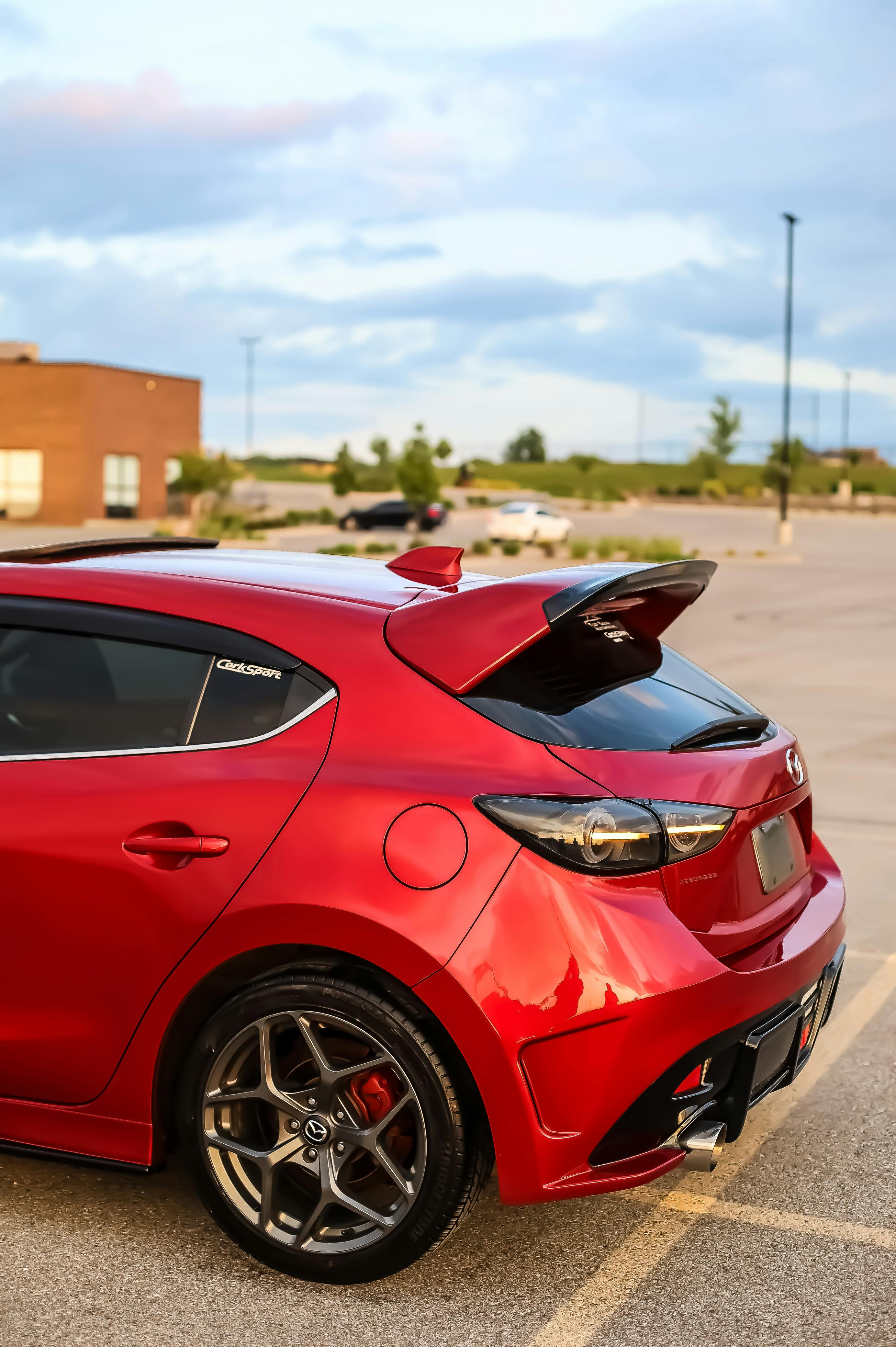 Back of red mazda 3 free stock photo