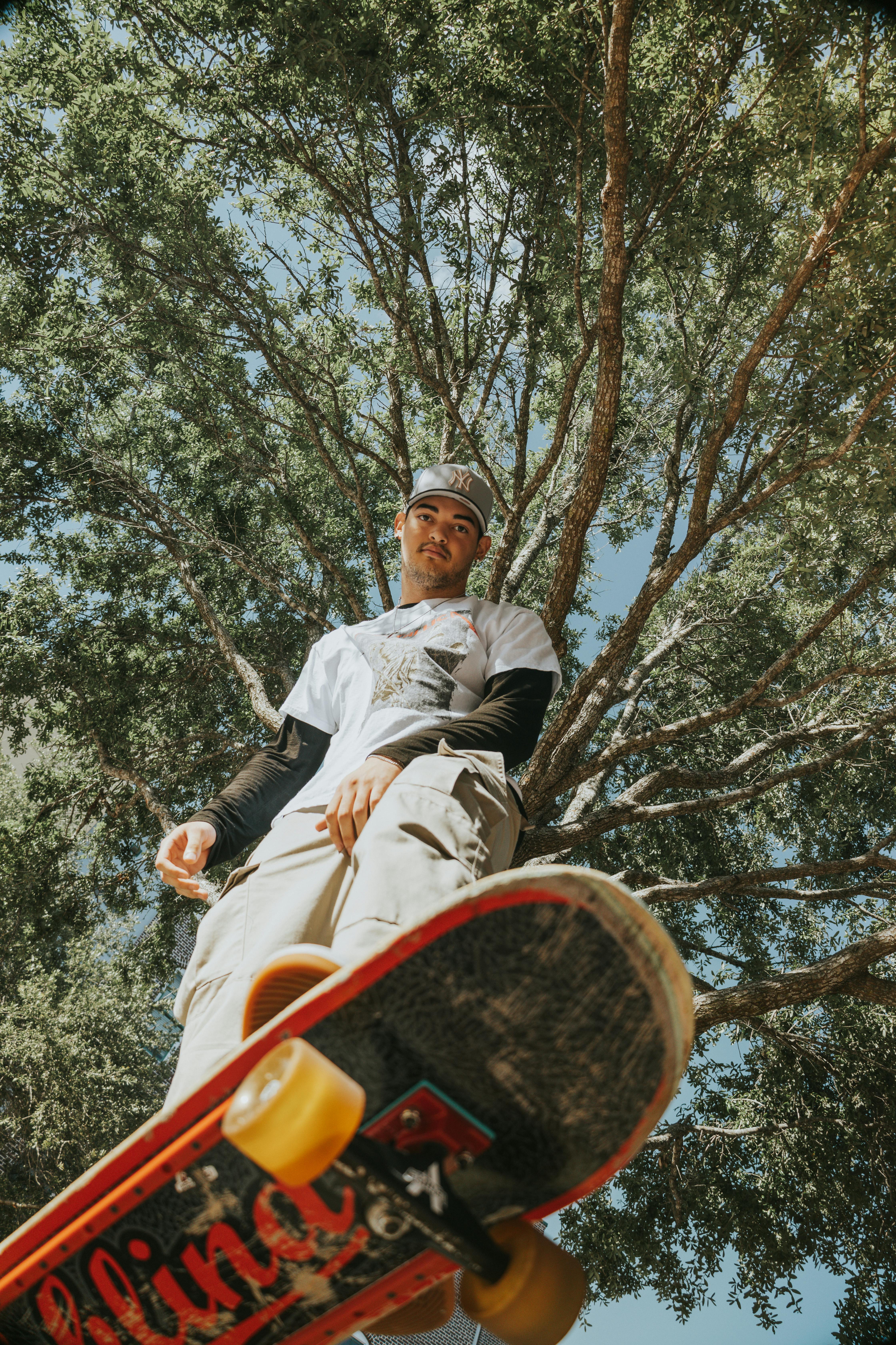 a man is doing a trick on his skateboard