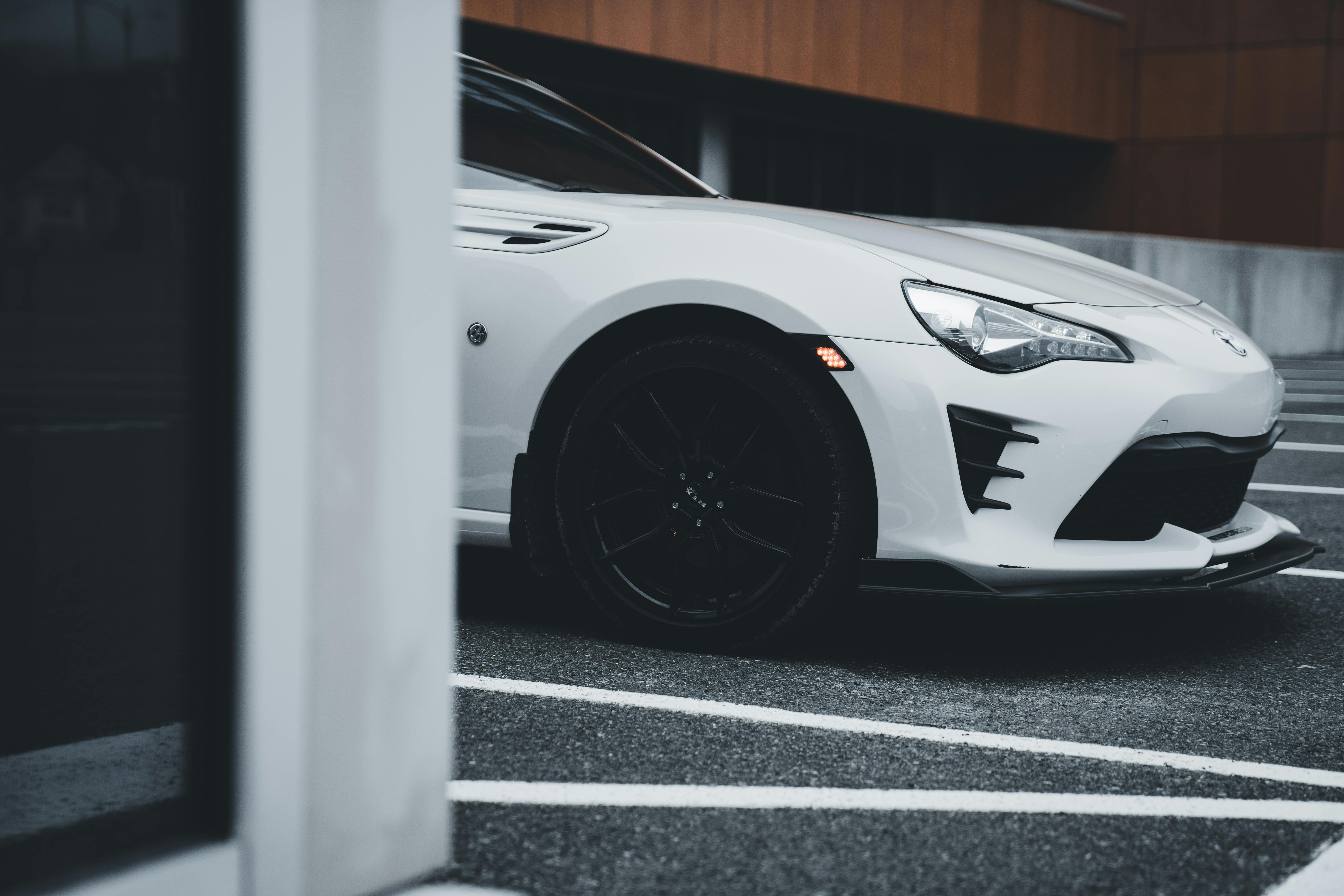 white car on car park