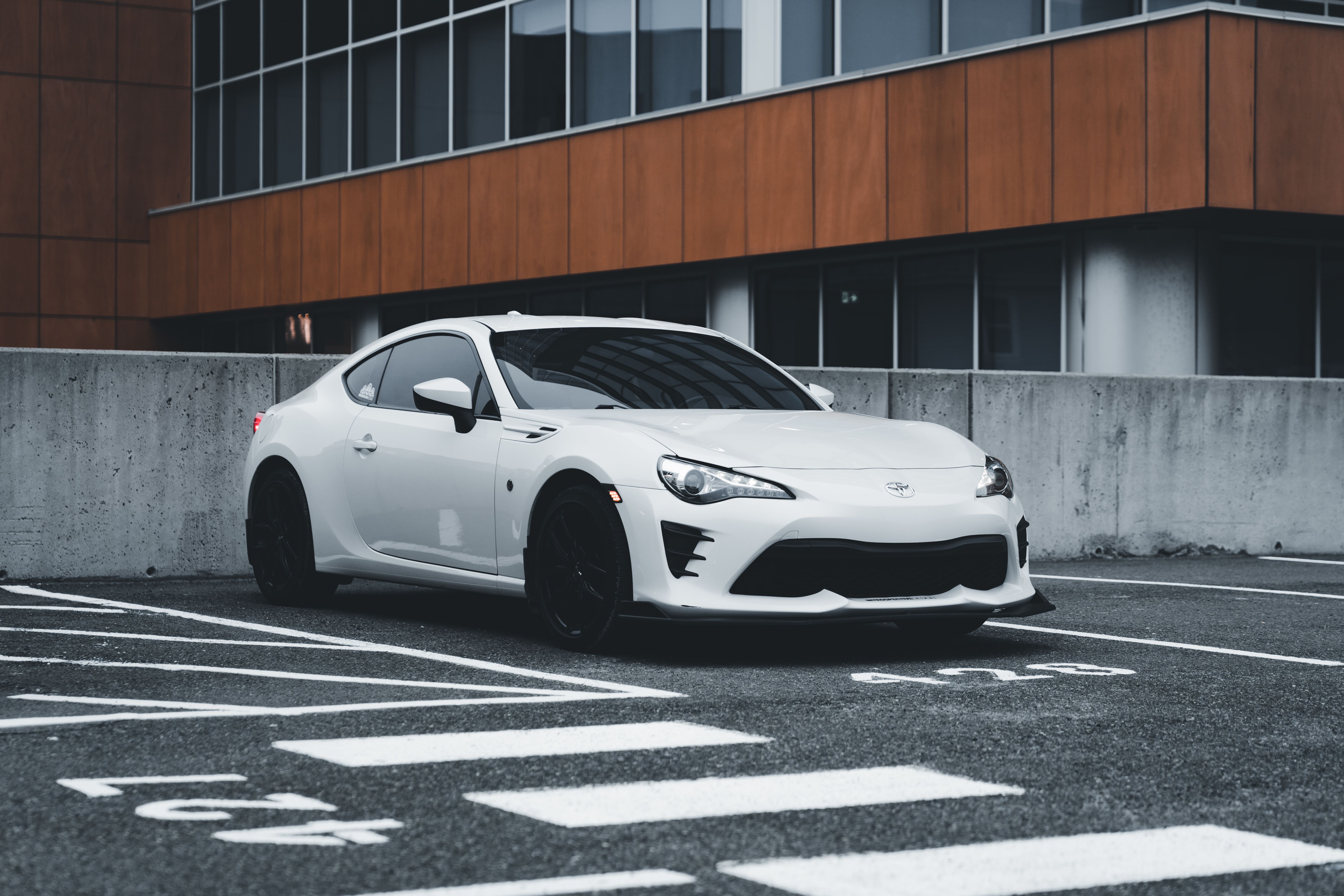 White Toyota 86 Sports Car Parked in a Residential Building Yard · Free ...
