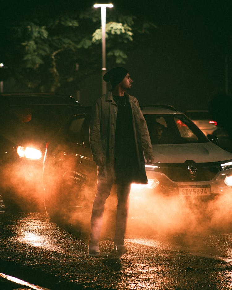 Man In Jacket At Night