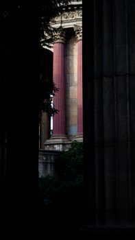 Vertical shot of majestic columns at the iconic Palace of Fine Arts in San Francisco.