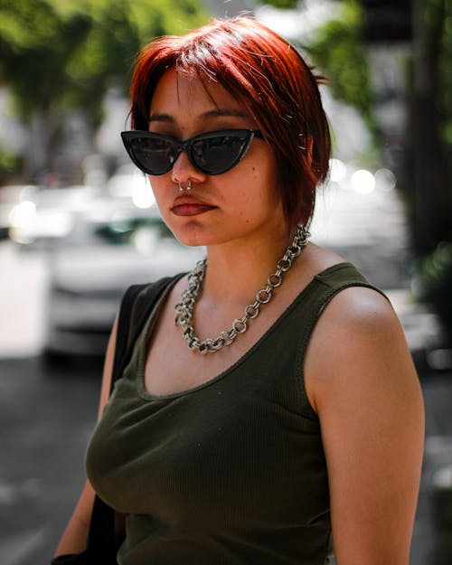 Portrait of Woman with Dyed Hair and Sunglasses