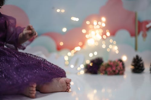 Close up of Baby in Purple Dress