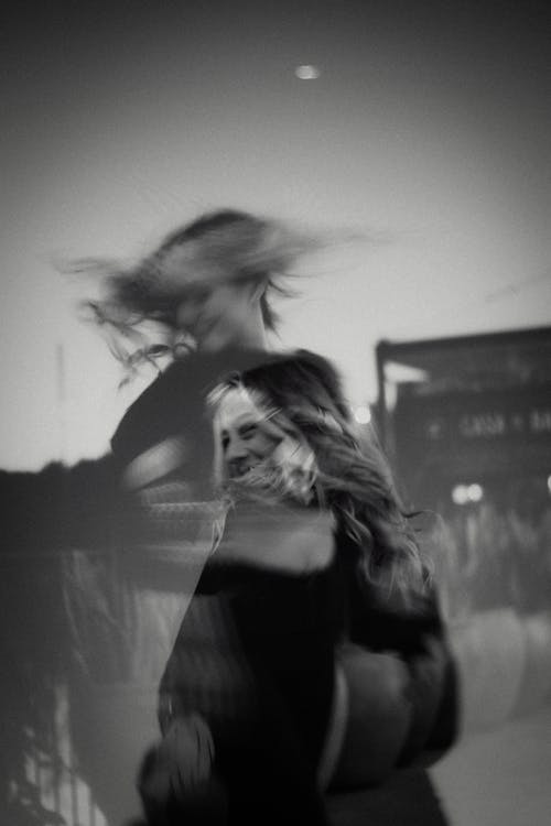 Black and White Picture with a Double Exposure Effect of a Woman Dancing 
