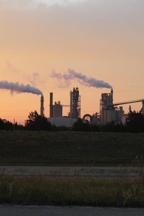 Smoke from Factory Chimneys at Sunset