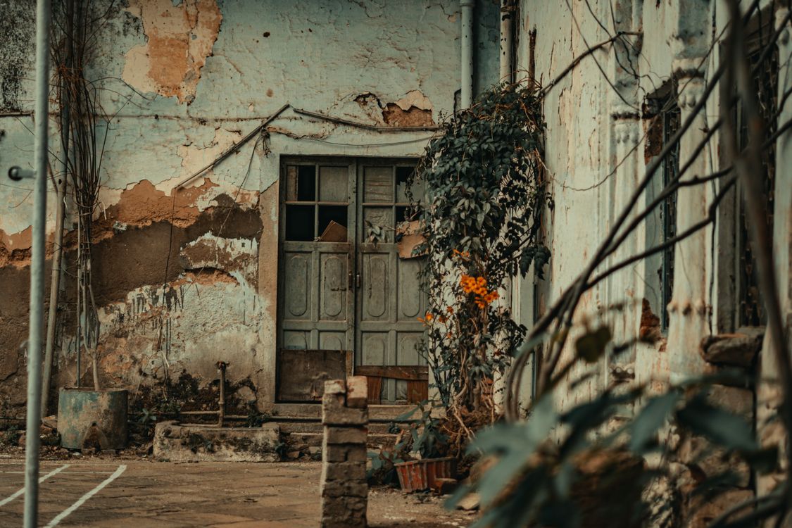 Abandoned Decaying Residential Building · Free Stock Photo