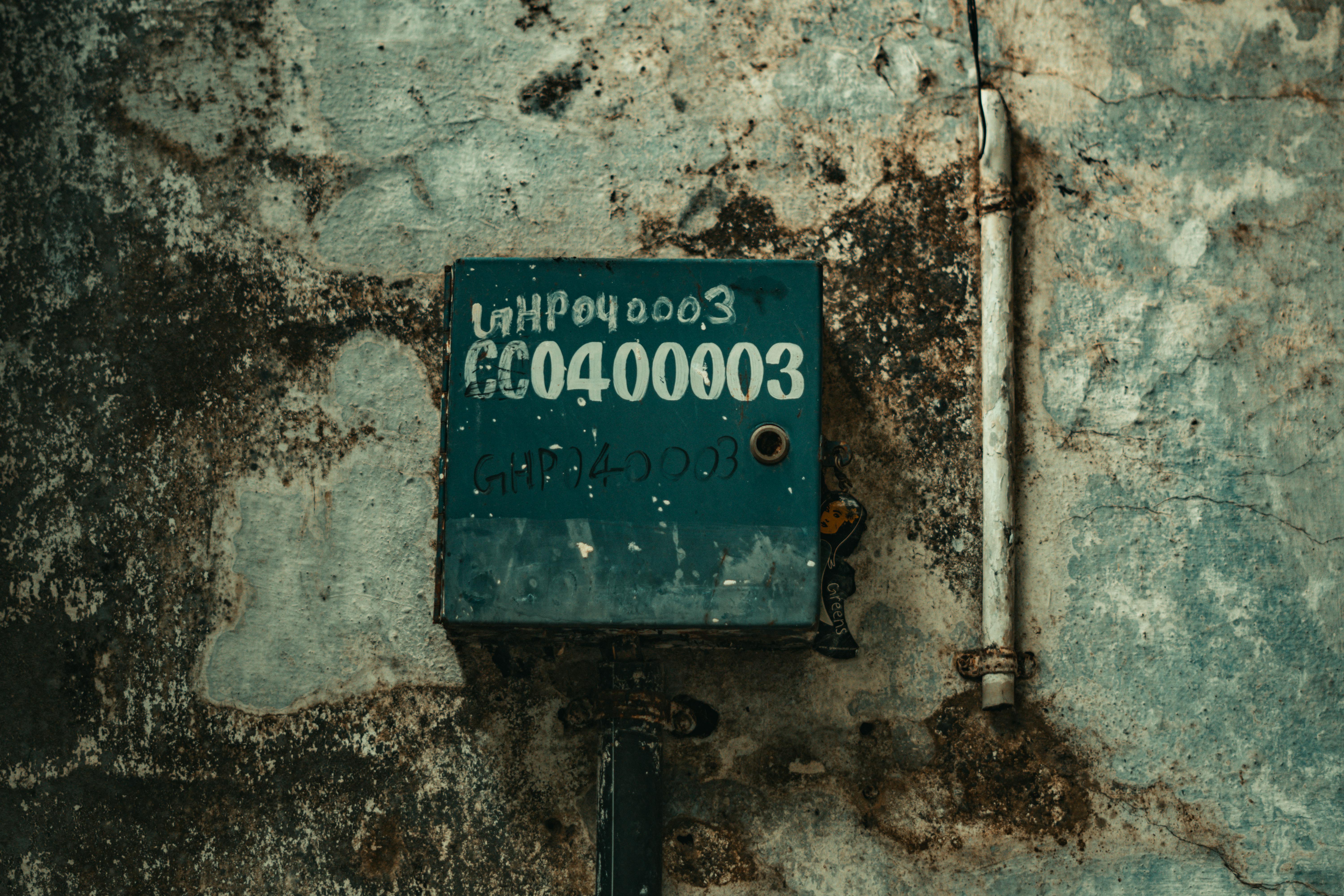 Corroded and damaged electrical panel showing burn marks - cost of new electrical panel