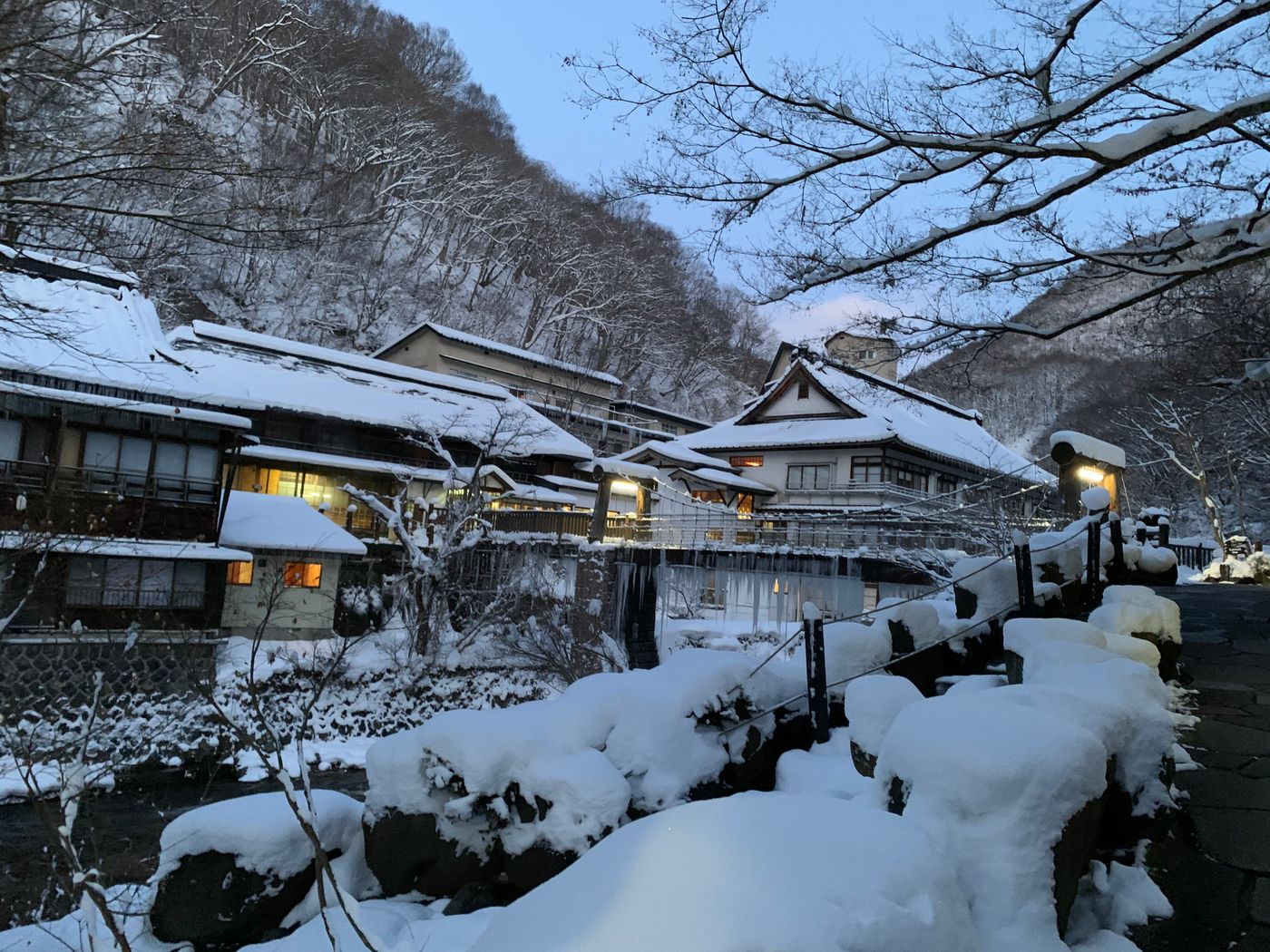 Snow-covered houses in Takayama at twilight, Gifu, Japan