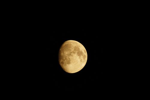 Free A clear and detailed photograph of the moon set against a dark sky, highlighting its surface features. Stock Photo
