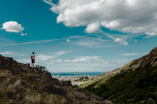 Free Person Standing Near Cliff Stock Photo