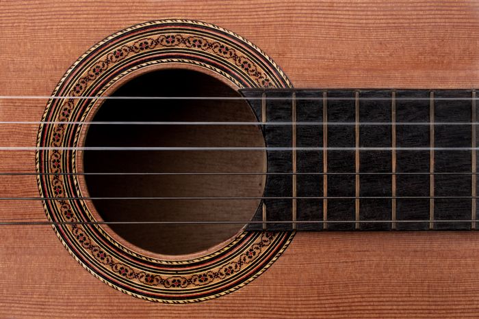 Detail of an old acoustic guitar rosette and soundhole