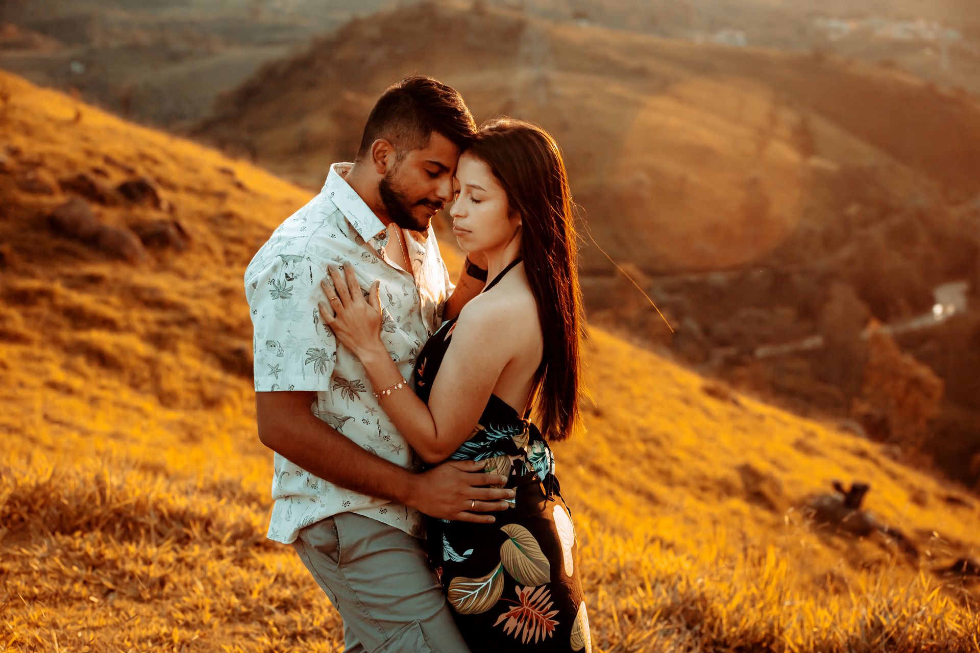 Couple in Dress and Shirt Standing and Hugging