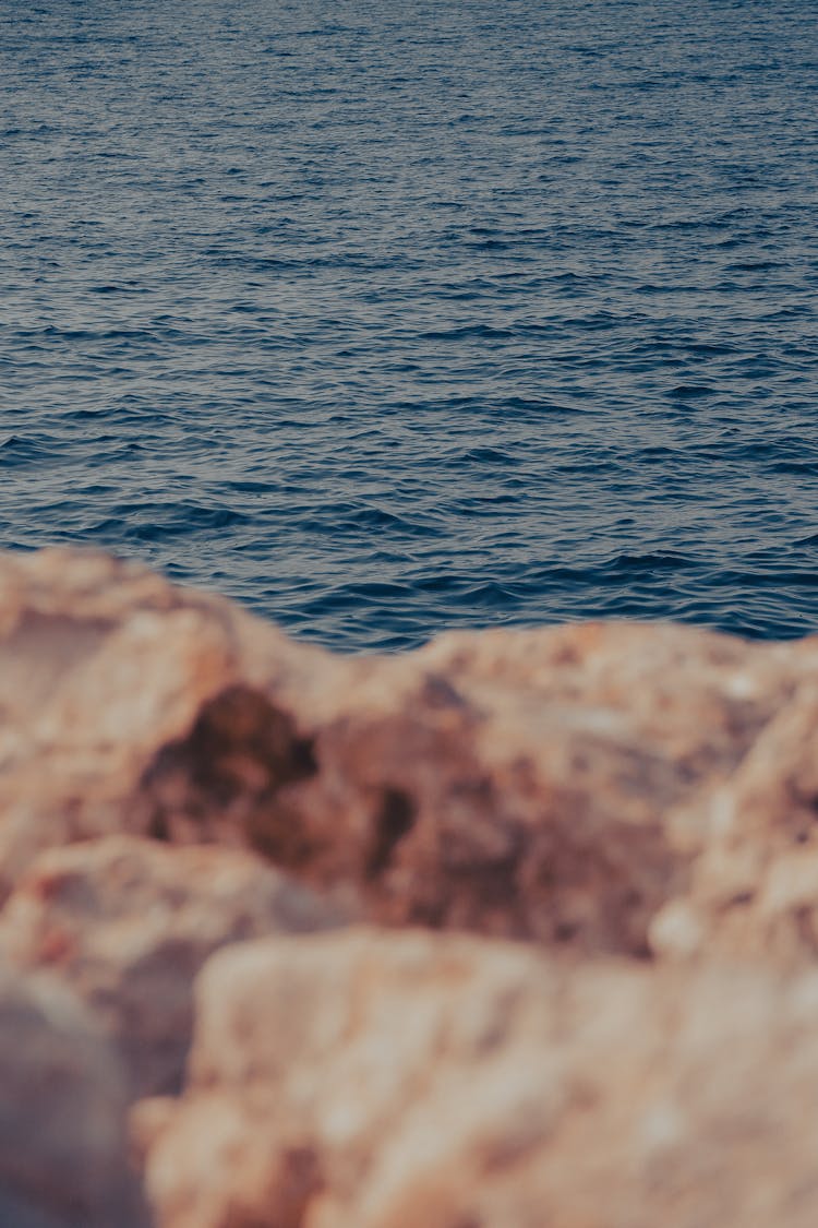 Waving Sea And Blurred Rock