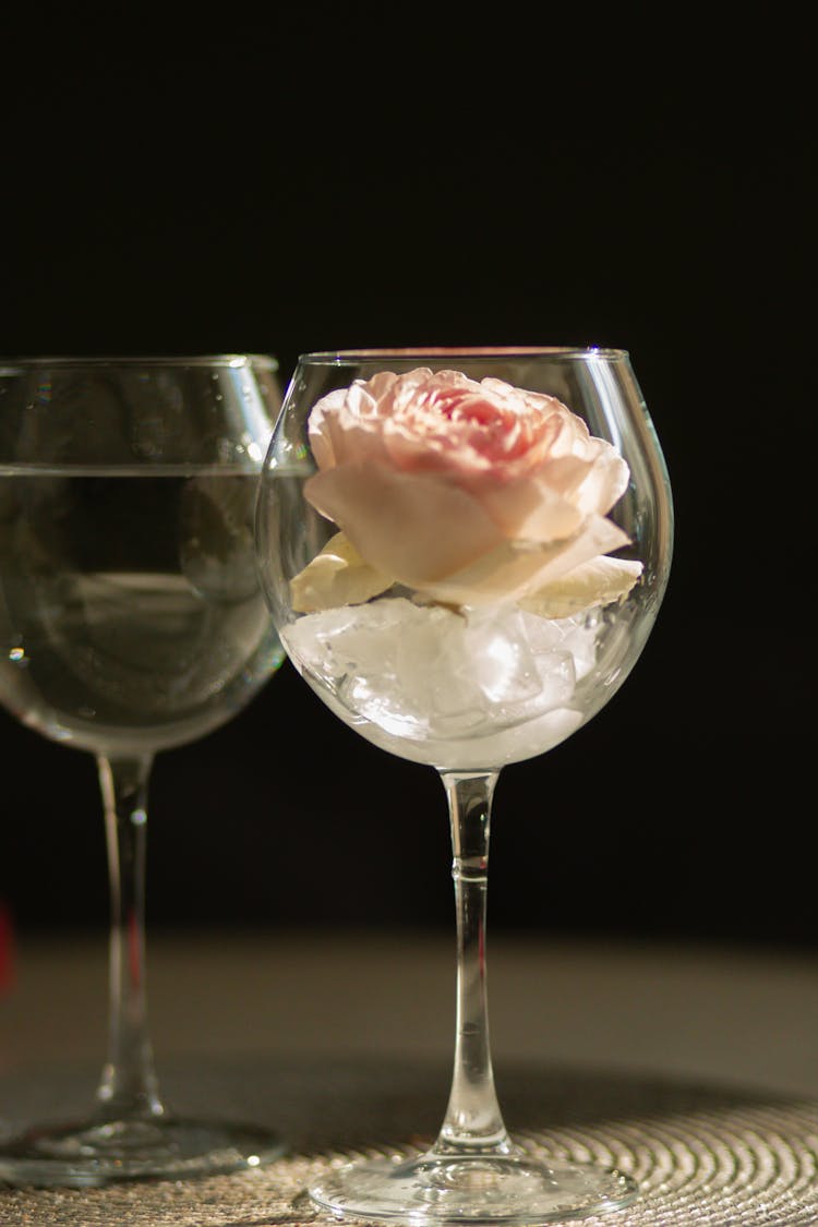 Glasses Of Water And With Roses