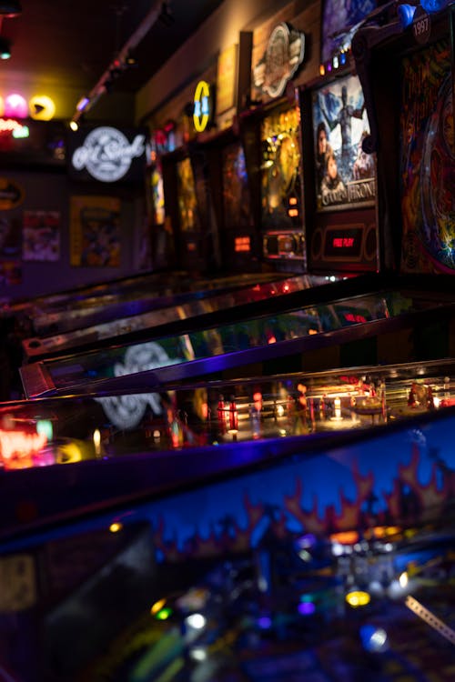 Close-up of Illuminated Arcade Machines 