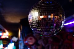 Glittering disco ball in a nightclub — photo by David Rado on Pexels