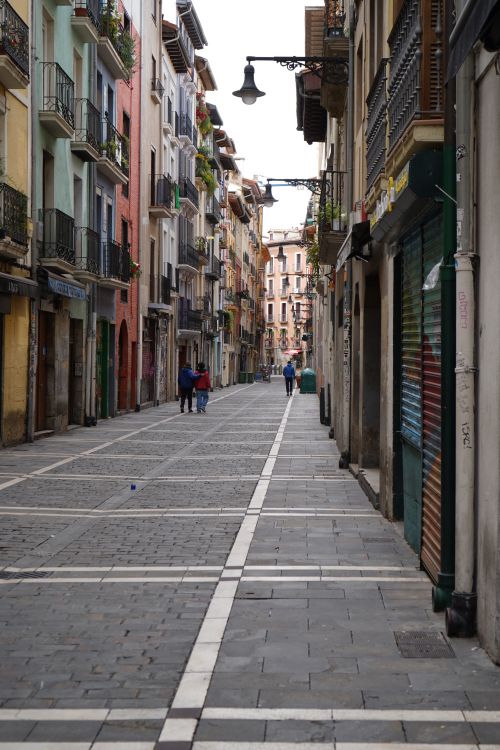 Free Discover the quaint urban charm of an alley in Pamplona, perfect for travel enthusiasts. Stock Photo