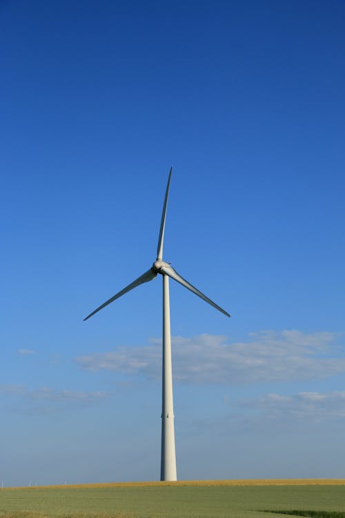 Free Wind Turbine in a Field  Stock Photo