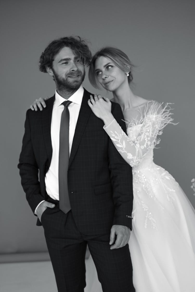 Models In Suit And Wedding Dress In Black And White