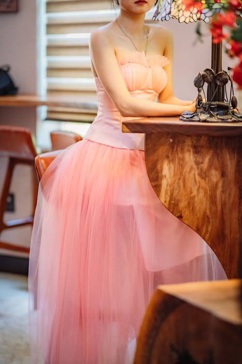 Young Woman in a Pink Tulle Dress