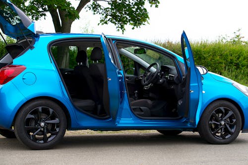 Blue Car with Open Doors 