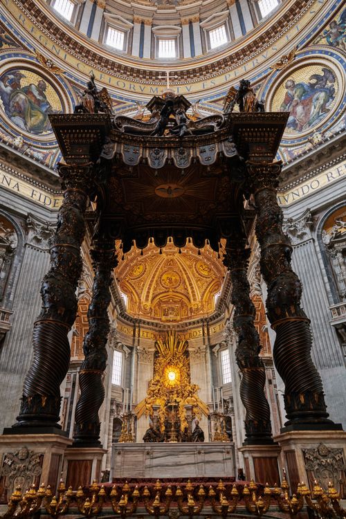 Free Intricate details of the Saint Peter's Baldachin in Vatican City's iconic basilica. Stock Photo