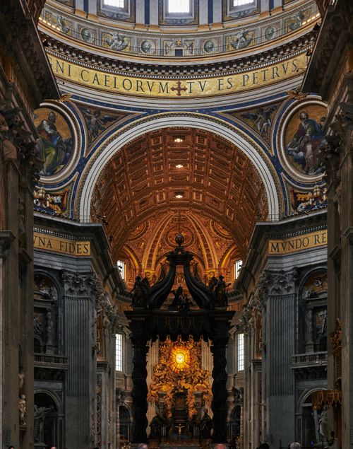 Free Beautiful ornate architecture inside St Peter's Basilica, highlighting historic frescoes and intricate designs. Stock Photo